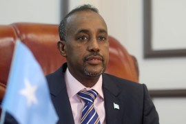 Somalia's Prime Minister Mohamed Hussein Roble looks on before addressing members of parliament in Mogadishu