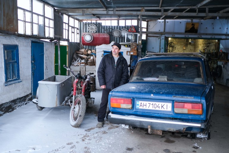 Sergei the mechanic by his car 2