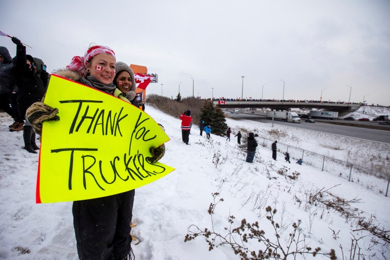 Supporters of truckers gather in Toronto, Ontario, Canada, to support truck drivers on their way to Ottawa to protest coronavirus disease (COVID-19) vaccine mandates for cross-border truck drivers