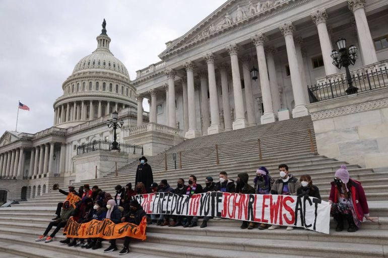 Faith leaders and students stage a sit-in protest at the US Congress