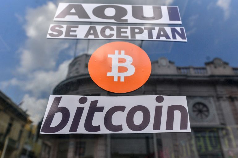 Signage announcing the acceptance of Bitcoin