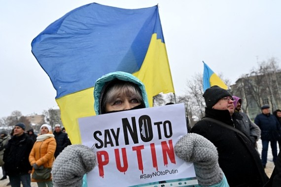 Demonstrators held placards and Kazakhstan flags in Kyiv, Ukraine.