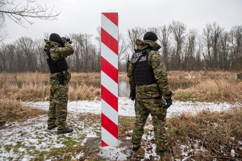 Polish border guards patrol at the Polish-Belarusian border