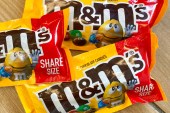 Mars, whose brands include Twix and Snickers, said that it will also put added emphasis on the ampersand in the M&M&#39;s logo to demonstrate how the brand aims to bring people together [File: Mike Stewart/AP Photo]