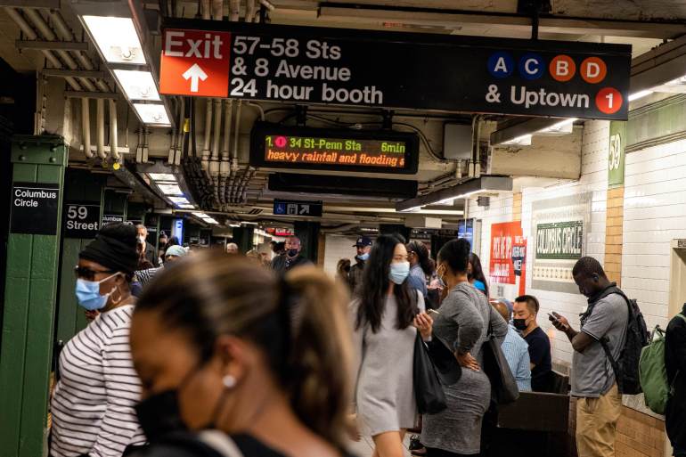 Displays warn commuters of delays caused by heavy rainfall and flooding during the morning rush in the NYC subway after the remnants of Tropical Storm Ida struck the northern mid-Atlantic, in New York City, United States