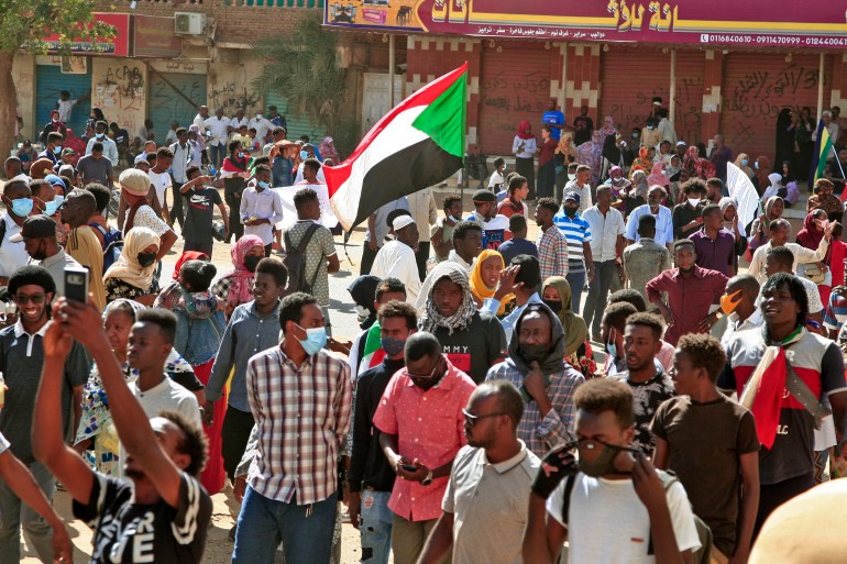 Sudanese protesters march during a demonstration calling for civilian rule and denouncing the military administration, in the capital Khartoum