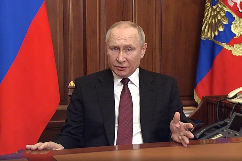 In this video grab taken from a handout footage made available on February 24, 2022 on the official web site of the Russian President (kremlin.ru) Russian President Vladimir Putin addresses the nation at the Kremlin in Moscow. - Russian President Vladimir Putin announced a "military operation" in Ukraine on February 24 and called on soldiers there to lay down their arms, defying Western outrage and global appeals not to launch a war.