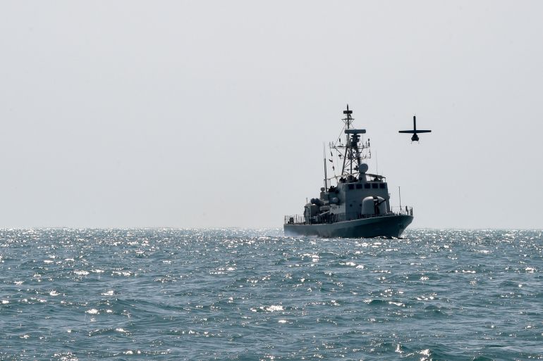 A US Navy Martin UAV drone flies over the Gulf waters as Royal Bahrain Naval Force (RBNF) Abdulrahman Al Fadhel takes part in joint naval exercise