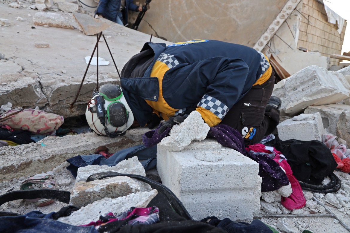 Syrian civil defence search on February 3, 2022 the scene following an overnight raid by US special operations forces