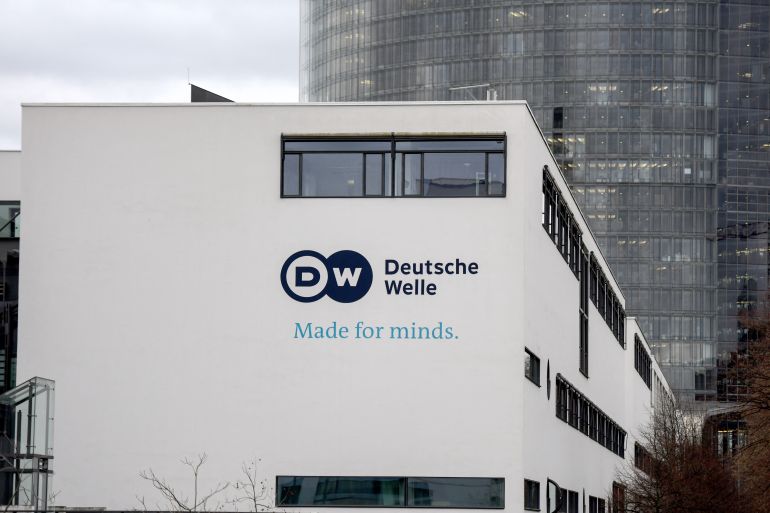 A picture shows the logo of German international broadcaster Deutsche Welle (DW) on a wall at their head office in Bonn, western Germany, on February 8, 2022. - Russia closed the Moscow bureau of German broadcaster Deutsche Welle and revoking staff accreditations in Russia on February 3, in response to Berlin's ban on the German-language channel of Russian state TV network RT. (Photo by Ina FASSBENDER / AFP)