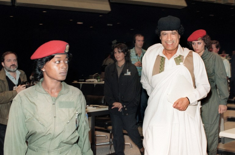 Gaddafi with female bodyguards