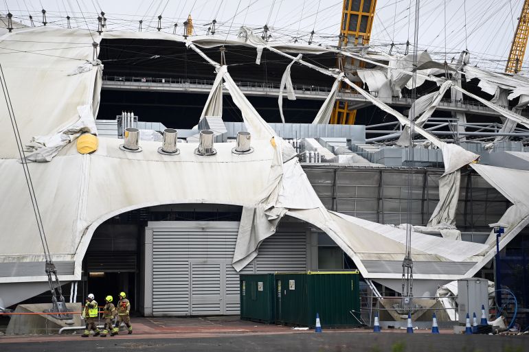 Damage is seen to the O2 Arena roof caused by heavy winds in London