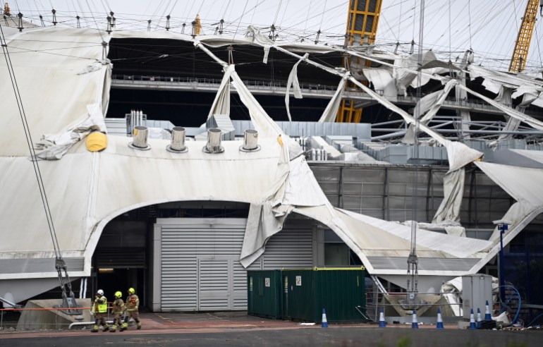 Damage is seen to the O2 Arena roof caused by heavy winds in London