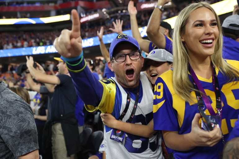 Fans react during Super Bowl LVI at SoFi Stadium [Katelyn Mulcahy/Getty Images via AFP]