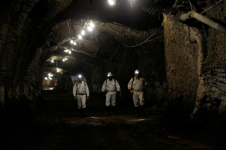 Workers are seen underground in a mine on the outskirts of Johannesburg, South Africa. [File: Siphiwe Sibeko/Reuters]