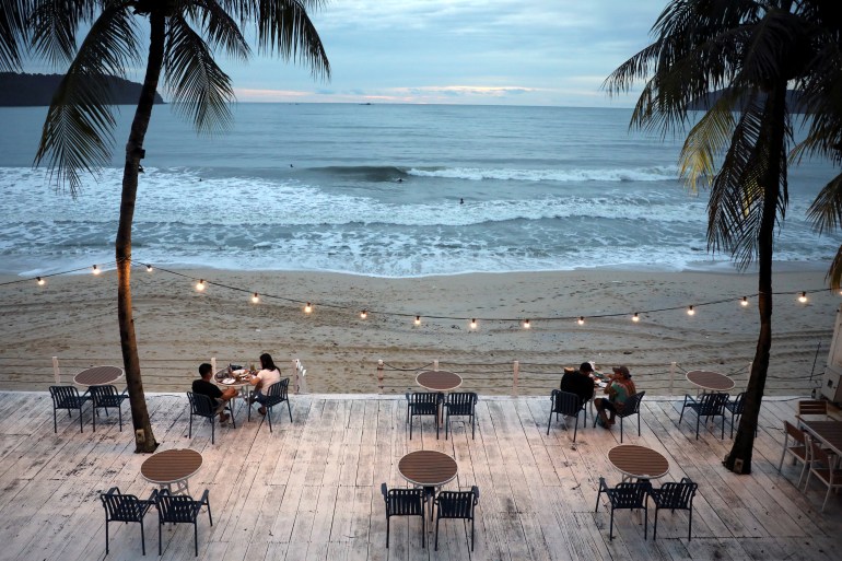 People dine-in at a restaurant following social distancing measures, as Langkawi gets ready to open to domestic tourists from September 16, amid the coronavirus disease (COVID-19) outbreak, Malaysia September 13, 2021. Picture taken September 13