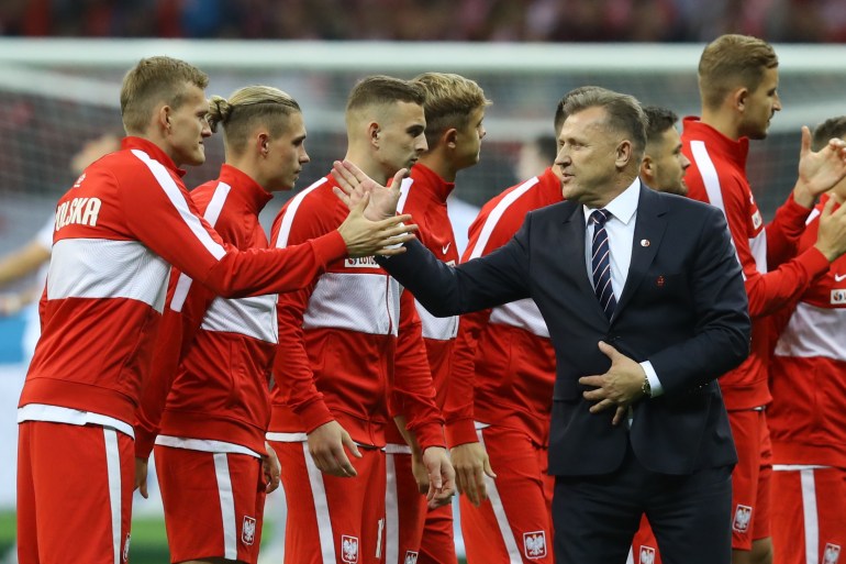 Poland players with president of the Polish Football Association Cezary Kulesza.