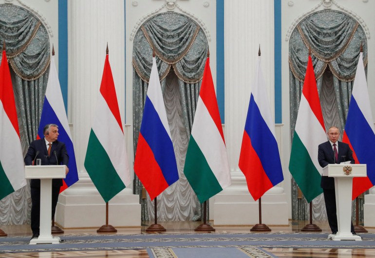 Russian President Vladimir Putin and Hungarian Prime Minister Viktor Orban attend a news conference
