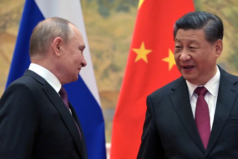Russian President Vladimir Putin attends a meeting with Chinese President Xi Jinping in Beijing.