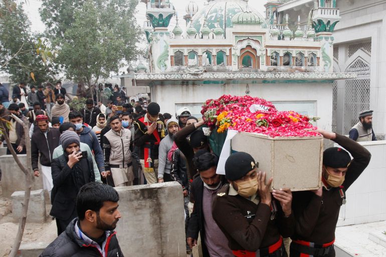 Army soldiers carry the coffin containing the body of Captain Bilal Khalil, who was killed along with others in an attack on a military base in Nushki