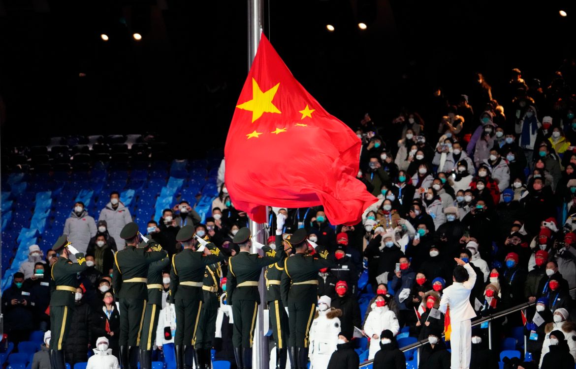The flag of China is brought into the stadium and raised during the Opening Ceremony of the Beijing 2022 Winter Olympic Games at Beijing National Stadium.