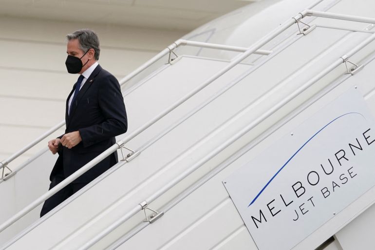 US Secretary of State Antony Blinken steps from his plane upon his arrival to attend the meeting of the Quadrilateral Security Dialogue (Quad) foreign ministers in Melbourne, Australia, February 9, 2022.