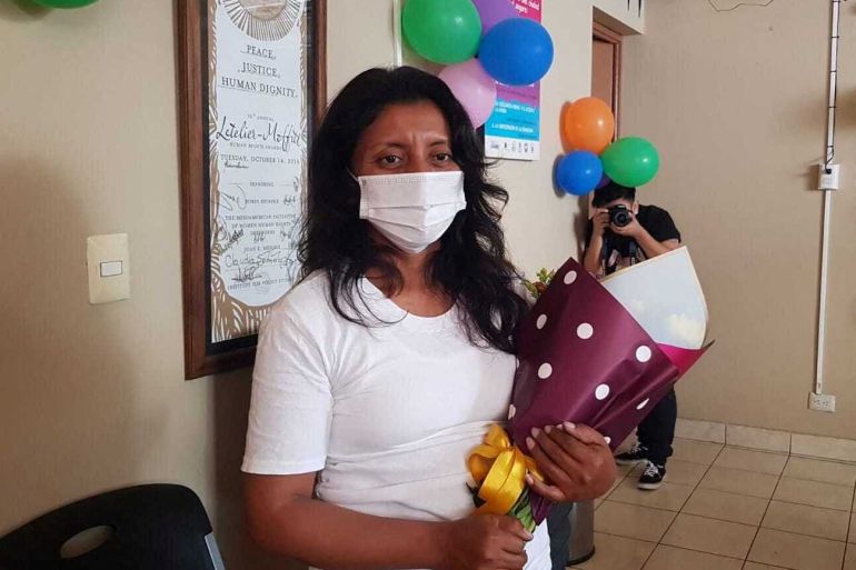 Elsy, who was sentenced to 30 years in prison and spent a decade behind bars for alleged aggravated homicide after suffering a miscarriage, poses for a picture after being released from jail in San Salvador