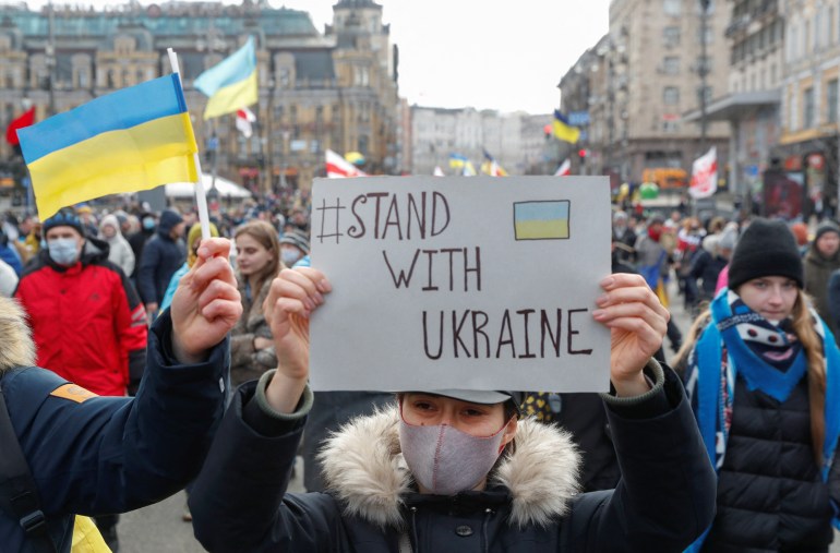 People take part in a march supporting Ukraine.