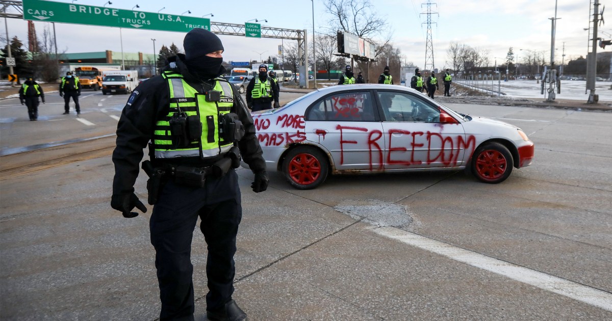 Canada resumes clearing protesters from US border bridge | Coronavirus pandemic News