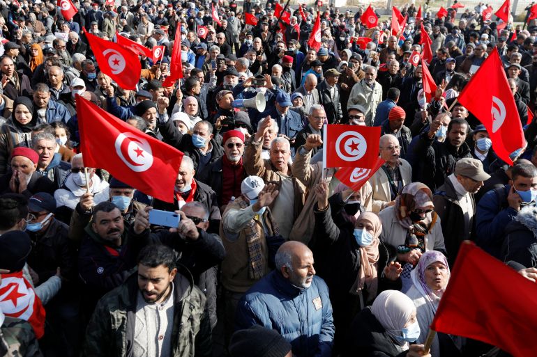 Demonstrators take part in a protest against Tunisian President Kais Saied's seizure of governing powers, in Tunis, Tunisia.