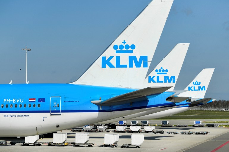 KLM planes parked at an airport
