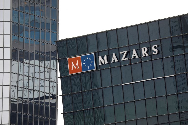 The logo of Mazars, an international, integrated organisation, that is specialised in audit, accounting, tax and advisory services is seen on a building in the financial district of la Defense near Paris, France