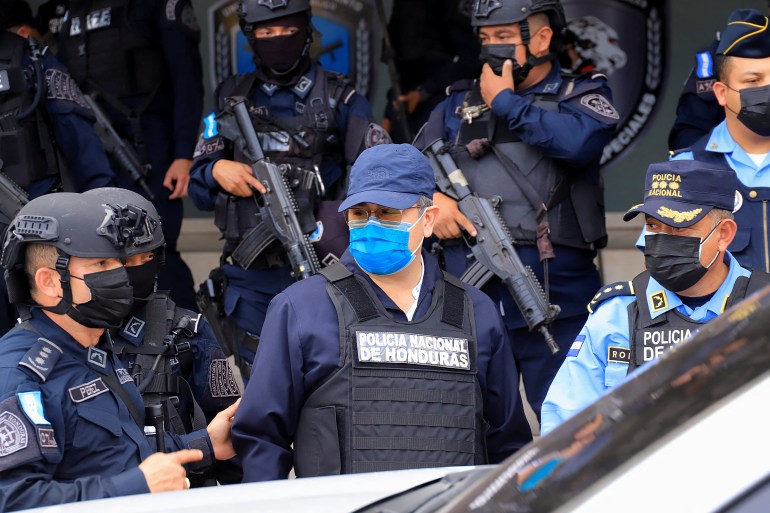 Former Honduran President Juan Orlando Hernandez being detained