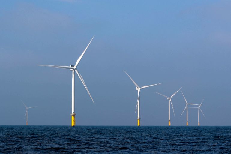 Power-generating windmill turbines are seen at the Eneco Luchterduinen offshore wind farm near Amsterdam, Netherlands