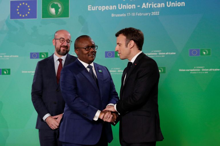 Guinea-Bissau's President Umaro Sissoco Embalo is welcomed by French President Emmanuel Macron and European Council President Charles Michel