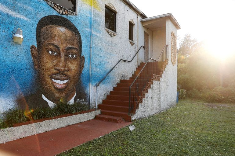 A mural of Ahmaud Arbery is painted on the side of the Brunswick African American Cultural Center in downtown Brunswick, Georgia,