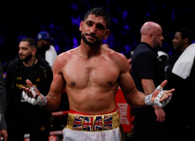 Boxing - Amir Khan v Kell Brook - AO Arena, Manchester, Britain - February 19, 2022 Amit Khan looks dejected after losing the fight Action Images via Reuters/Andrew Couldridge