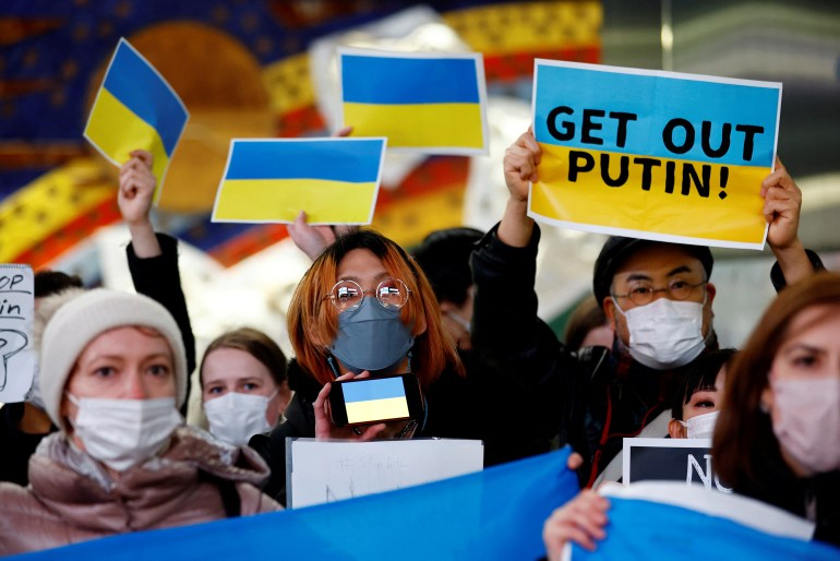 Protesters attend a rally against Russia's attack on Ukraine, in Tokyo, Japan. 