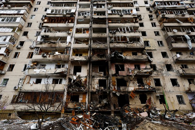 A damaged highrise residential building is seen, after Russia launched a massive military operation against Ukraine.