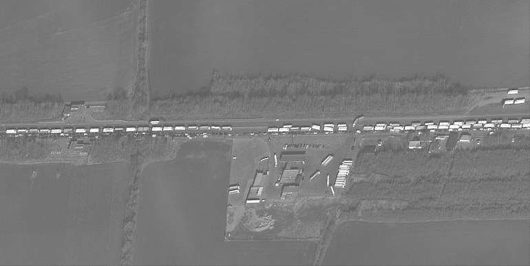 A satellite image shows a long traffic jam of vehicles leaving Ukraine