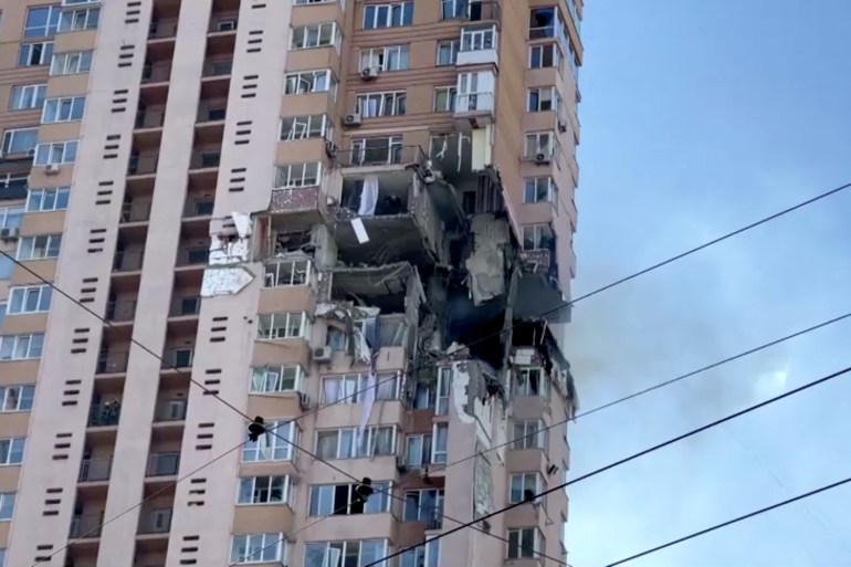A screengrab from a video shows a damaged multi-storey residential building in an aftermath of shelling, after Russia launched a massive military operation against Ukraine, in south-west of Kyiv, Ukraine