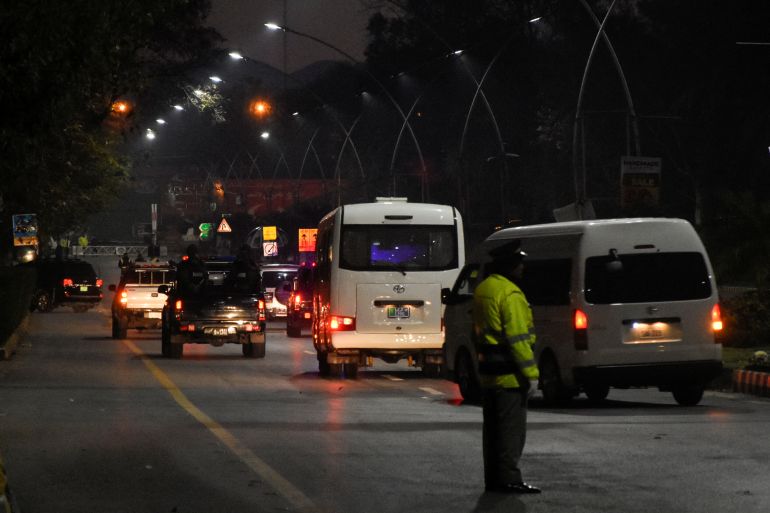Vehicles carrying Australian cricket team pass by in Islamabad,