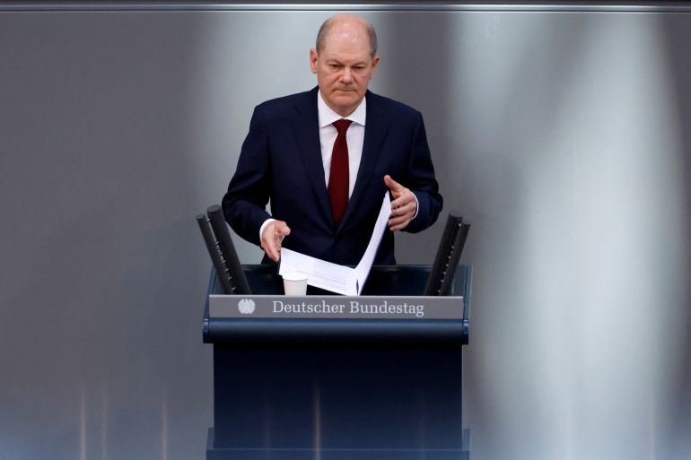 German Chancellor Olaf Scholz addresses an extraordinary session, after Russia launched a huge military operation against Ukraine, at the lower house of parliament Bundestag in Berlin, Germany