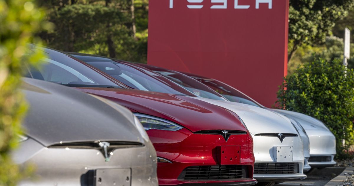 Tesla agrees to disable self-driving feature that runs stop signs