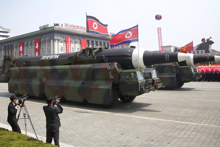 what analysts believe could be the North Korean Hwasong 12 is paraded across a flag-festooned Kim Il Sung Square during a military parade in Pyongyang,