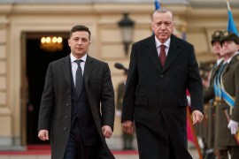Ukrainian President Volodymyr Zelenskyy walks with Turkish President Recep Tayyip Erdogan