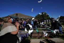 Renee Maldonado, a niece of murdered journalist Lourdes Maldonado, shouts "fly free auntie," as doves are released during her burial service at the Monte de los Olivos cemetery in Tijuana, Mexico