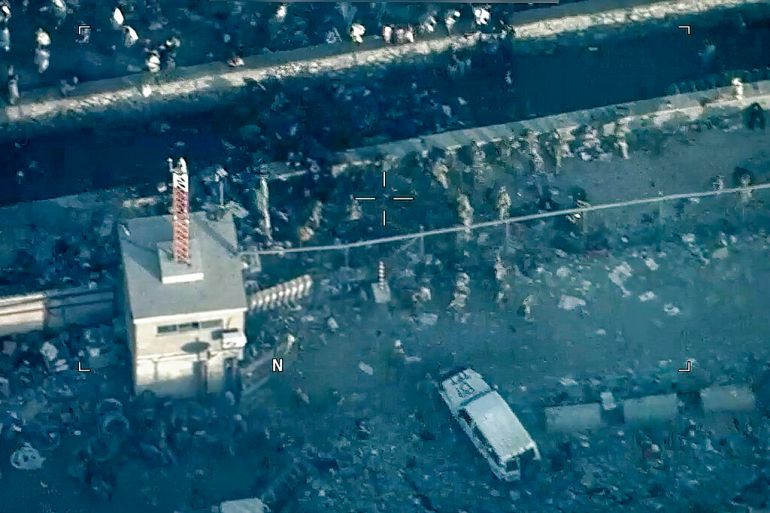 Aerial image from a video released by the Department of Defense shows US Marines around the scene at Abbey Gate outside Hamid Karzai International Airport in Kabul Afghanistan, after a suicide bomber detonated an explosion.