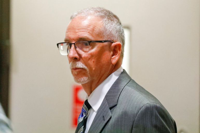 UCLA gynecologist James Heaps in suit and tie appears in Los Angeles Superior Court.