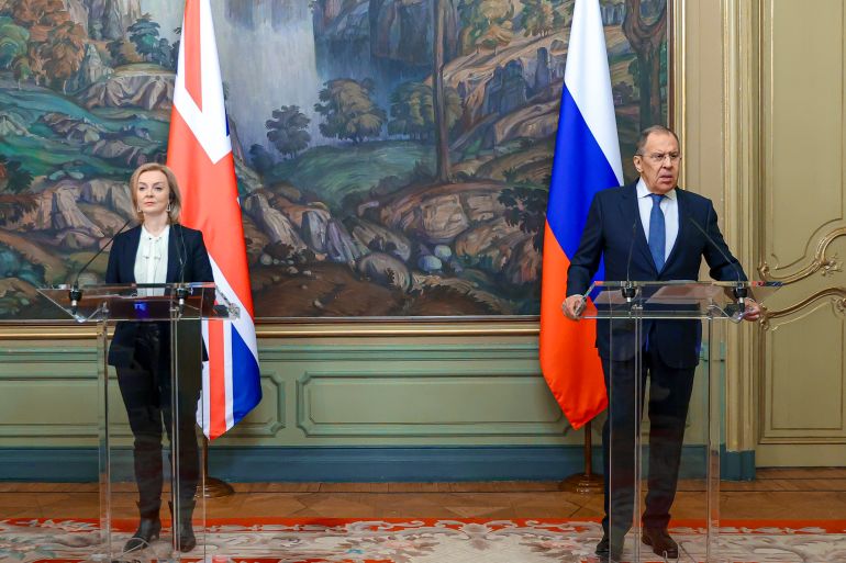 Russian Foreign Minister Sergey Lavrov, right, and British Foreign Secretary Liz Truss